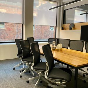 United Co melbourne meeting room with ergonomic seating screen sharing for presentations and natural light