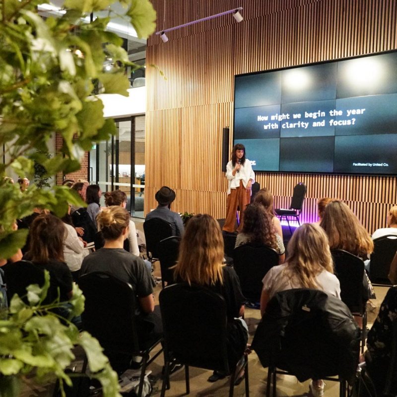 Venue with a woman speaking