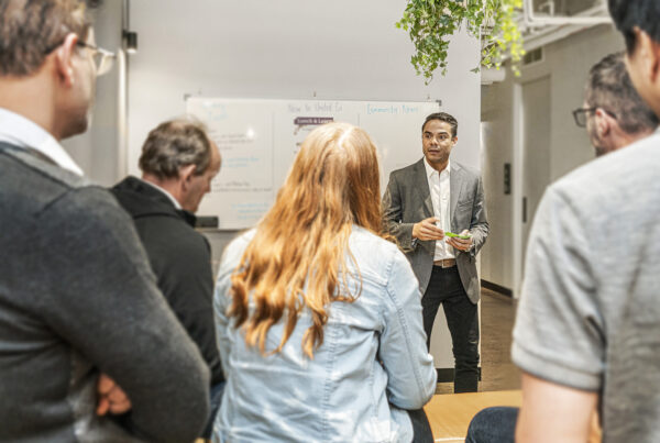 Group of people having a meeting at UnitedCo.