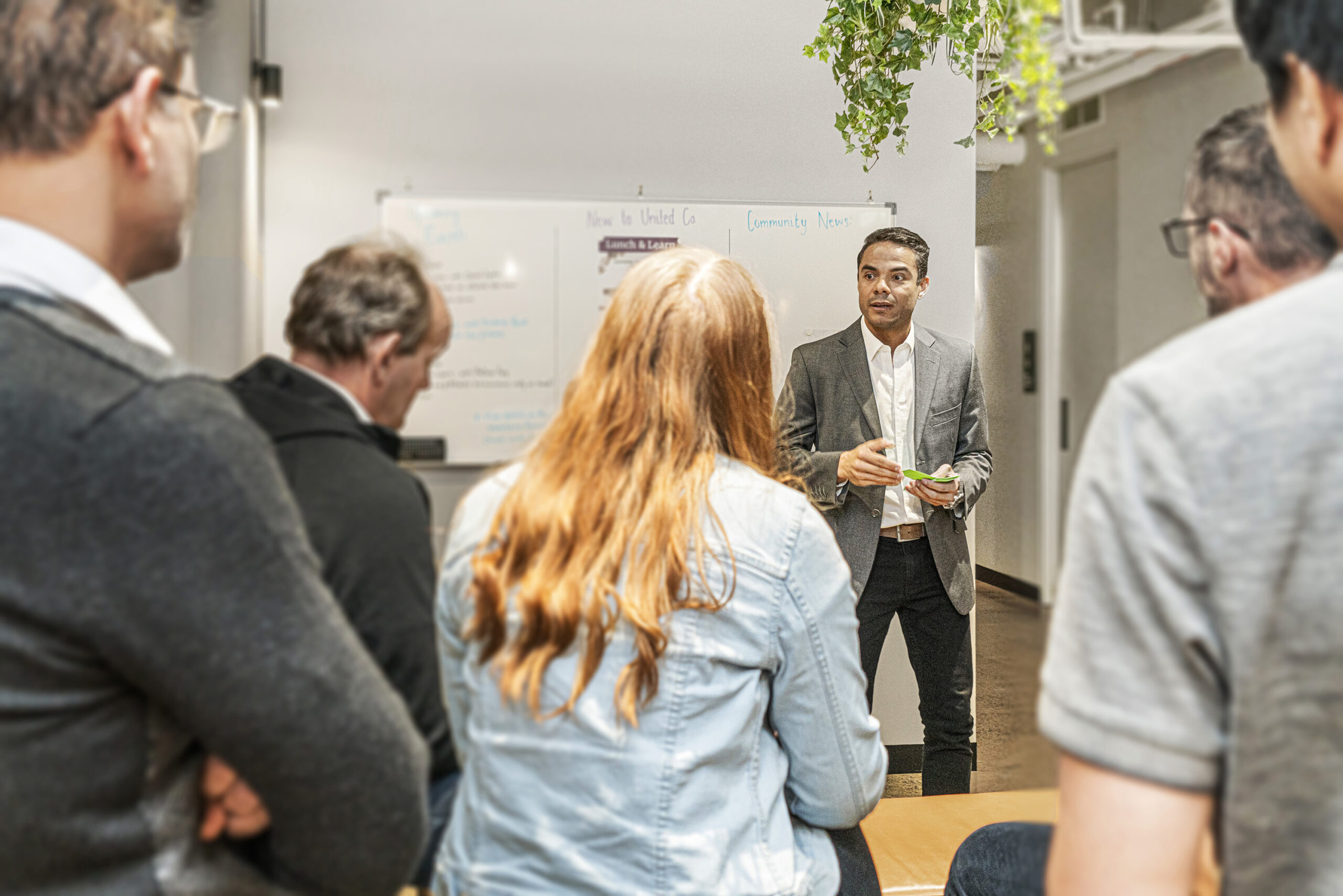 Group of people having a meeting at UnitedCo.