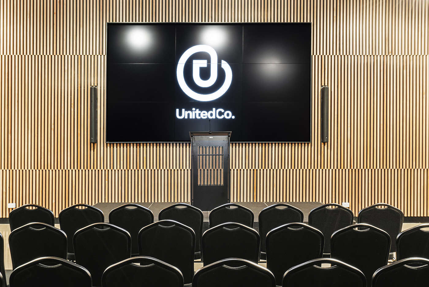 event venue with large video wall and built in microphones